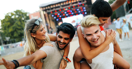 Group of young happy friends having fun timeの写真素材