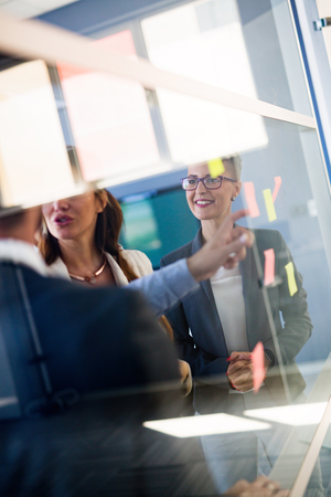 Creative business people working on business project in officeの写真素材