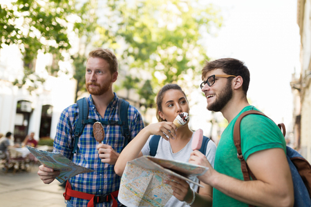 Happy tourists traveling and sightseeingの写真素材
