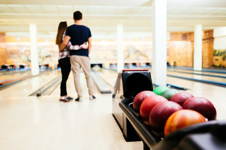 Couple enjoy bowling togetherの写真素材