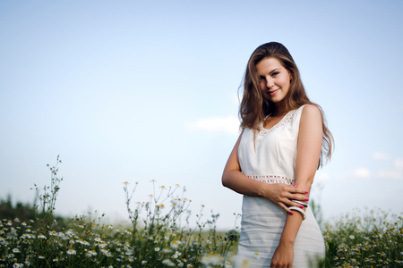 Young beautiful woman spending time in natureの写真素材