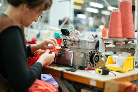 Woman working in textile industryの写真素材