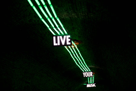 Portrait of neon sign isolated on blackの写真素材