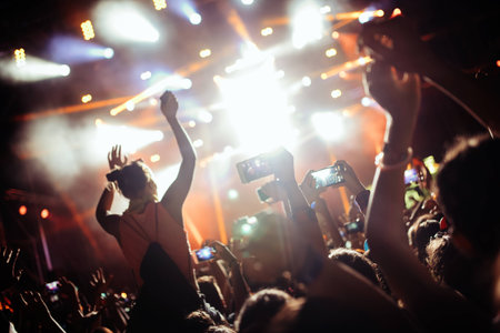 Portrait of happy crowd enjoying at music festival