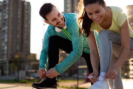 Friends fitness training together outdoors living active healthy
