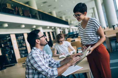 Young woman and man studying for an exam.の写真素材