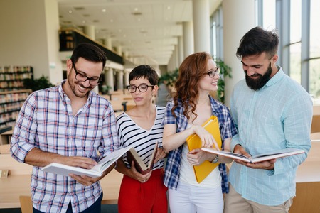 Group of college students studying