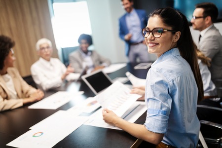Business colleagues in conference meeting room presentationの写真素材
