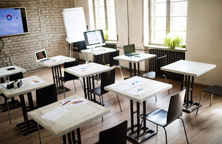 Interior of a modern bright classroom or officeの写真素材