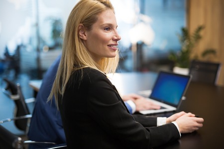 Picture of attractive businesswoman in conference roomの写真素材