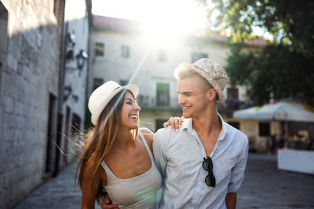 Tourist couple in love enjoying city sightseeing at summerの写真素材