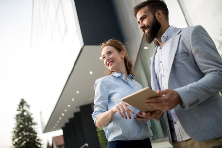 Young business people cooperatingの写真素材