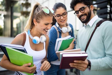 Group of young students are studying together in universityの写真素材
