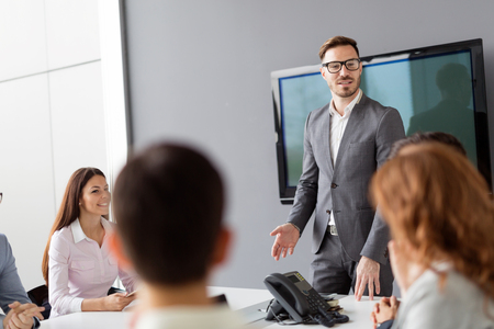 Group of business people collaborating in officeの写真素材
