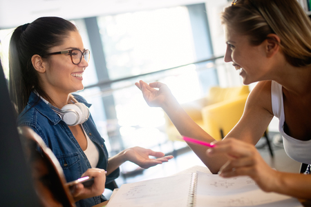 Group of friends studying together at university campusの写真素材