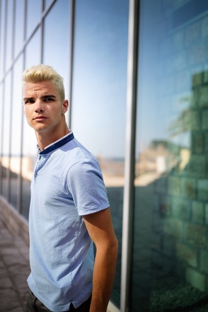 Portrait of a handsome man in urban background