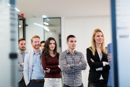 Portrait of business team posing in office