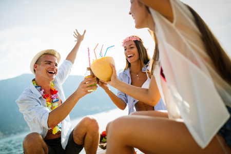 Group of friends enjoying summer vacation. Summer, holidays, vacation and happiness conceptの写真素材