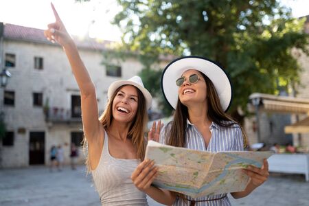 Girl friends travelling summer vacation exploring to discover carefree lifestyle