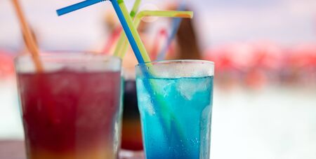 Tropical fresh cocktails drinks on tropical beachの写真素材
