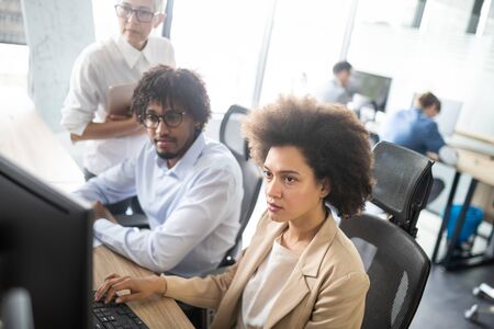 Successful business group of people at work in officeの写真素材