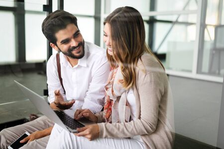 Young couple or college student using laptop computer notebook work together