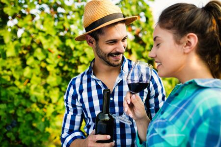 Portrait of happy people spending time in vineyard