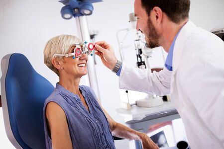 Ophthalmology concept. Patient eye vision examination in ophthalmological clinicの写真素材