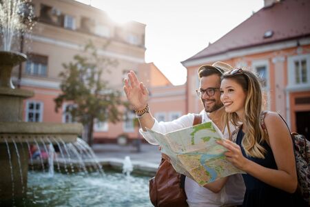 Happy tourist couple in love having fun, travel, smiling on vacationの写真素材
