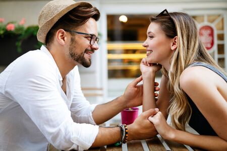 Summer holidays, dating, love and tourism concept. Smiling couple in the cityの写真素材