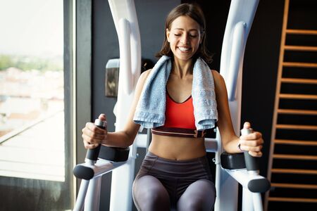 Beautiful fit women working out in gym