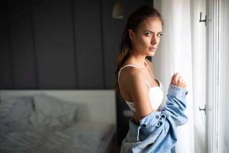 Portrait of beautiful sexy young woman with glamorous faceの写真素材