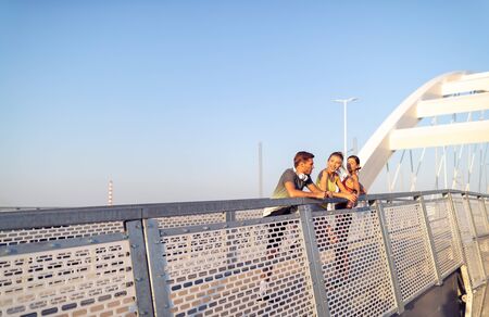 Friends having a break from training, running, jogging outdoors.の写真素材