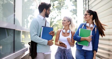 College students studying on university campus outdoor
