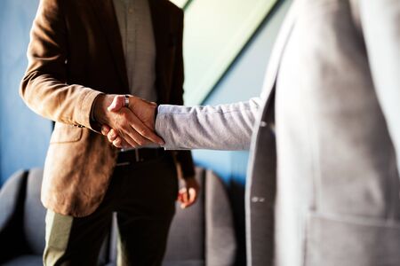 Business handshake and business people concept. Partnership, deal, agreement.