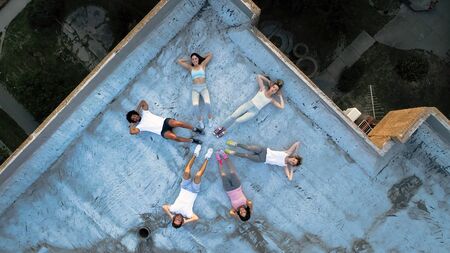 Friends fitness training together outdoors living active healthyの写真素材