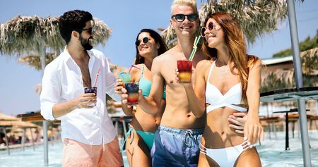Friends beach party drinks celebration summer vacation concept