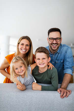 Portrait of happy smiling family at homeの写真素材