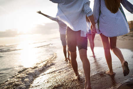 Friendship freedom group vacation beach summer holiday conceptの写真素材