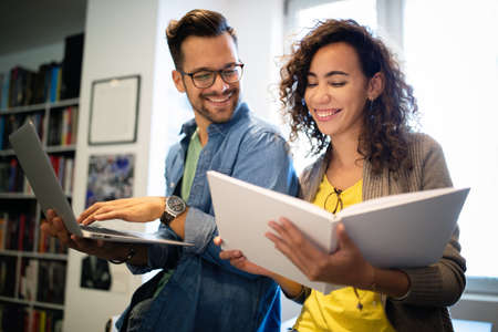 Young university students studying together. Group of multiracial friends in college