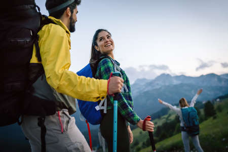 Group of friends on a hiking, camping trip in the mountainsの写真素材