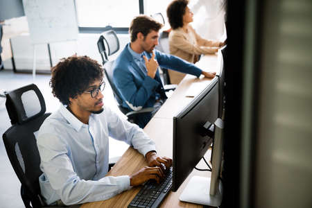 Startup programmer people group working everyday job at modern office