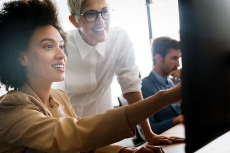 Creative people working in office on computerの写真素材