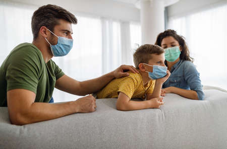 Modern family at preventive quarantine due to global pandemiaの写真素材