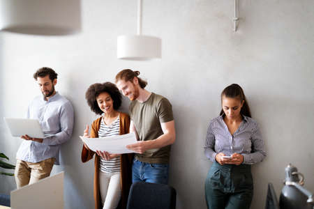 Group of people in a business meeting discussing ideas in office