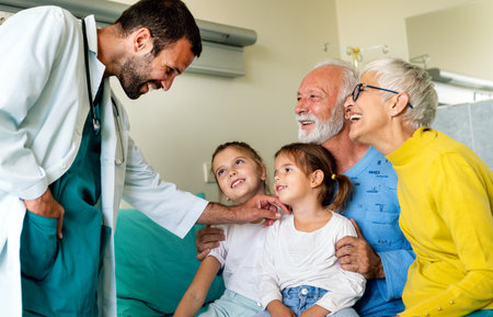 Family visiting mature male patient in hospital. Healthcare, pensioner, family support concept