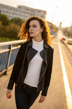 Outdoor fashion portrait of glamour sensual young ladyの写真素材