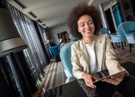 Portrait of a fashionable african business womanの写真素材