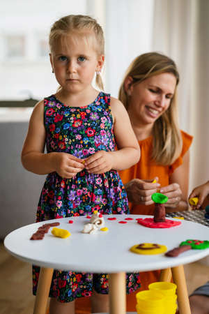 Happy child kids group have fun and play at kindergardenの写真素材