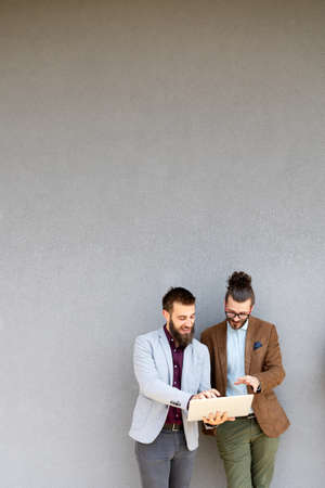 Group of success business people discussing ideas at meeting outsideの写真素材